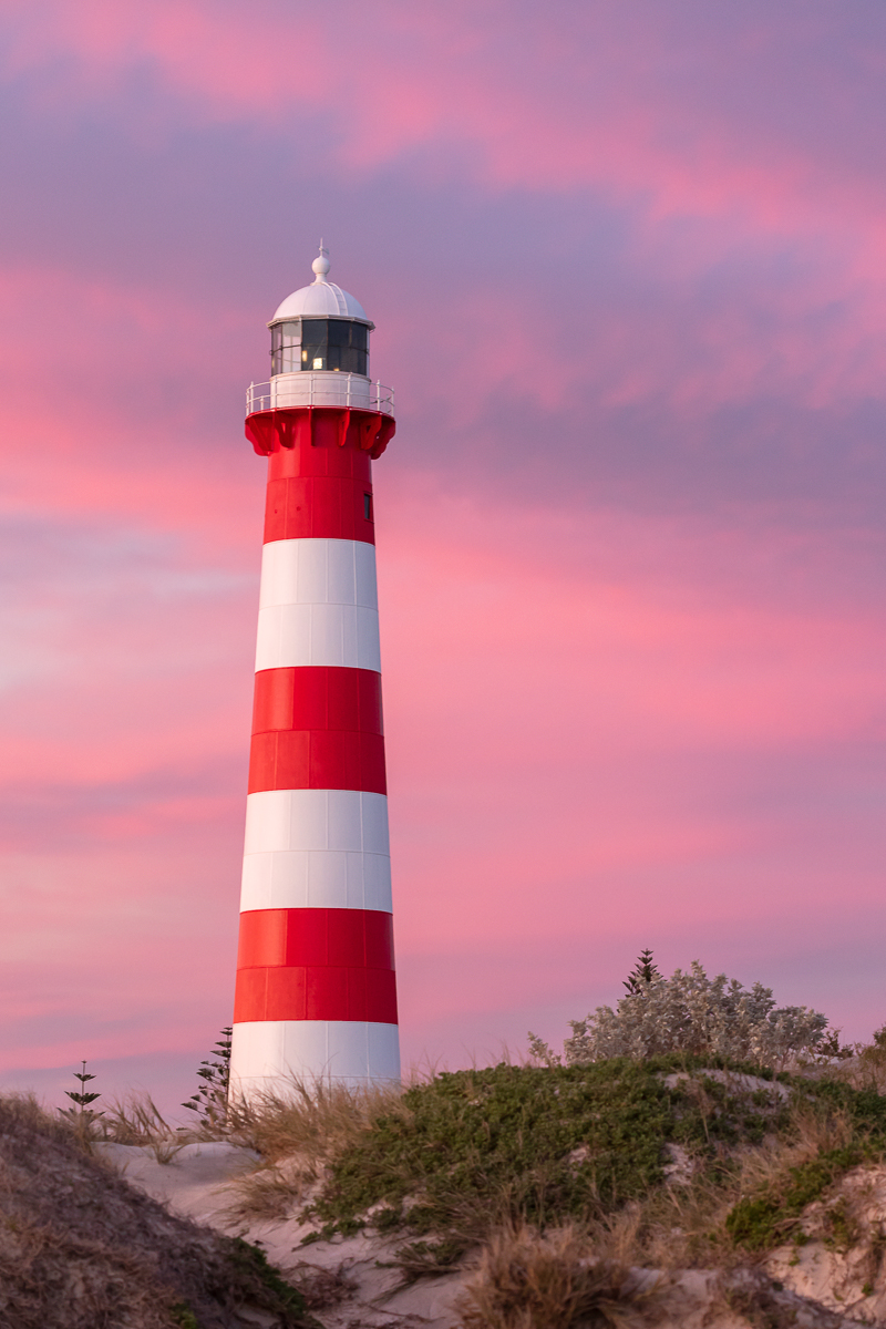 Point Moore Lighthouse photo at sunset with a pink sky