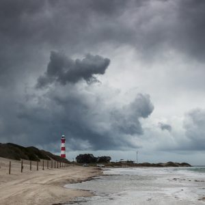 Landscape photograph of Point Moore Lighthouse in a storm, Geraldton